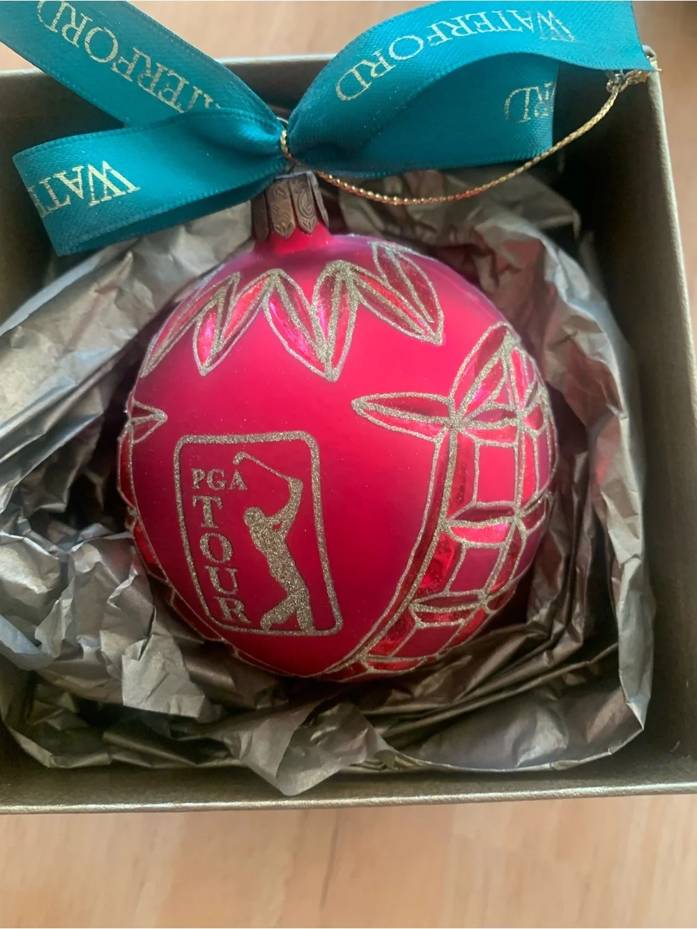 Waterford Red Glass Ornament with Gold Glitter Accents with PGA Logo.
